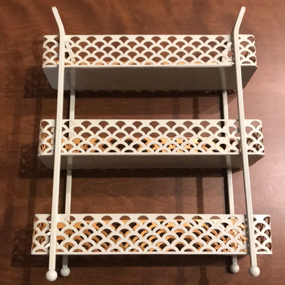 Small pastel and gold storage rack